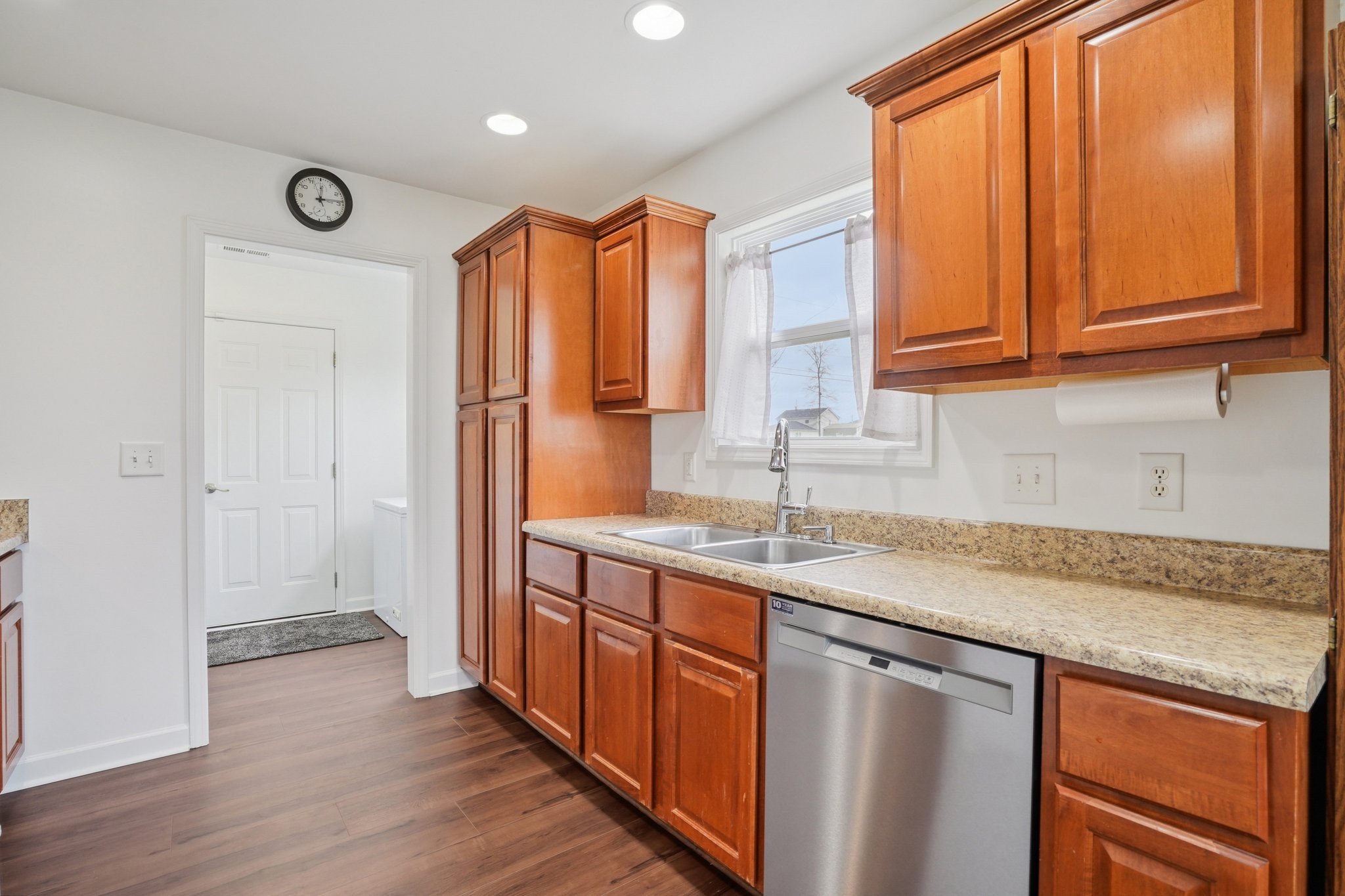 206 Hickory Pointe Dickson, TN 37055 - Photo 11 of 28 a kitchen with stainless steel appliances granite countertop a sink a stove and a refrigerator