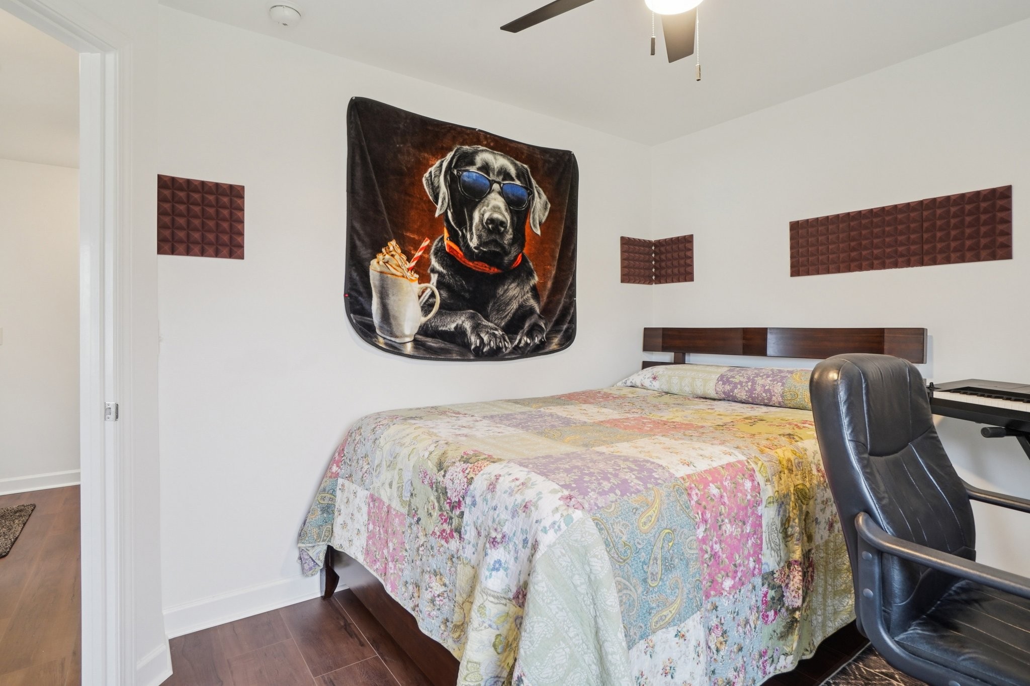 206 Hickory Pointe Dickson, TN 37055 - Photo 15 of 28 a bedroom with a bed and painting on the wall