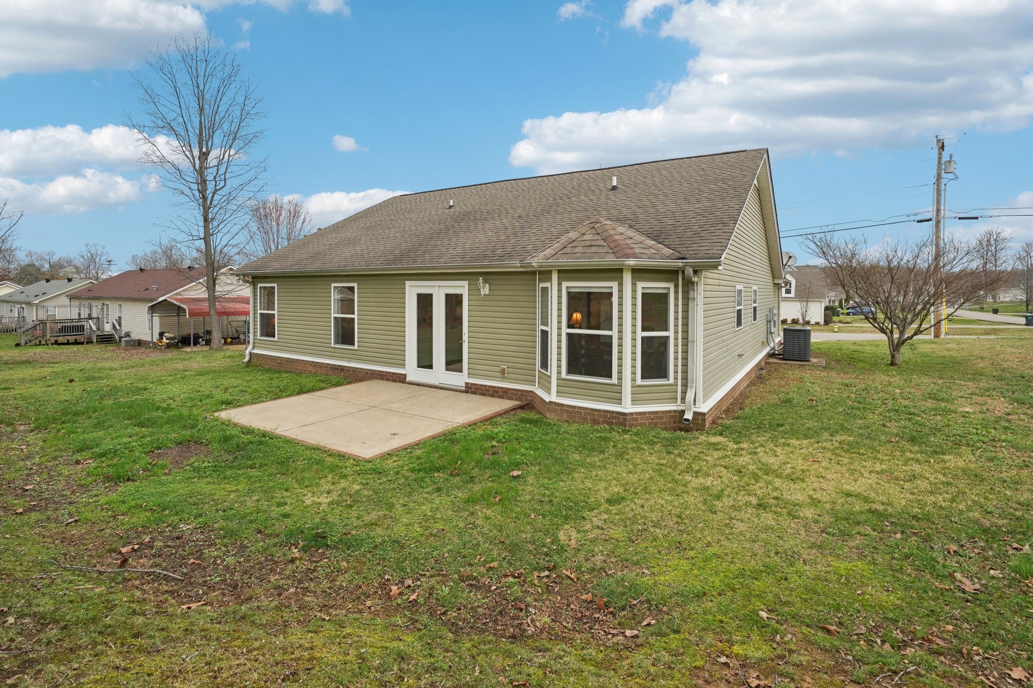 206 Hickory Pointe Dickson, TN 37055 - Photo 25 of 28 a view of a house with a backyard