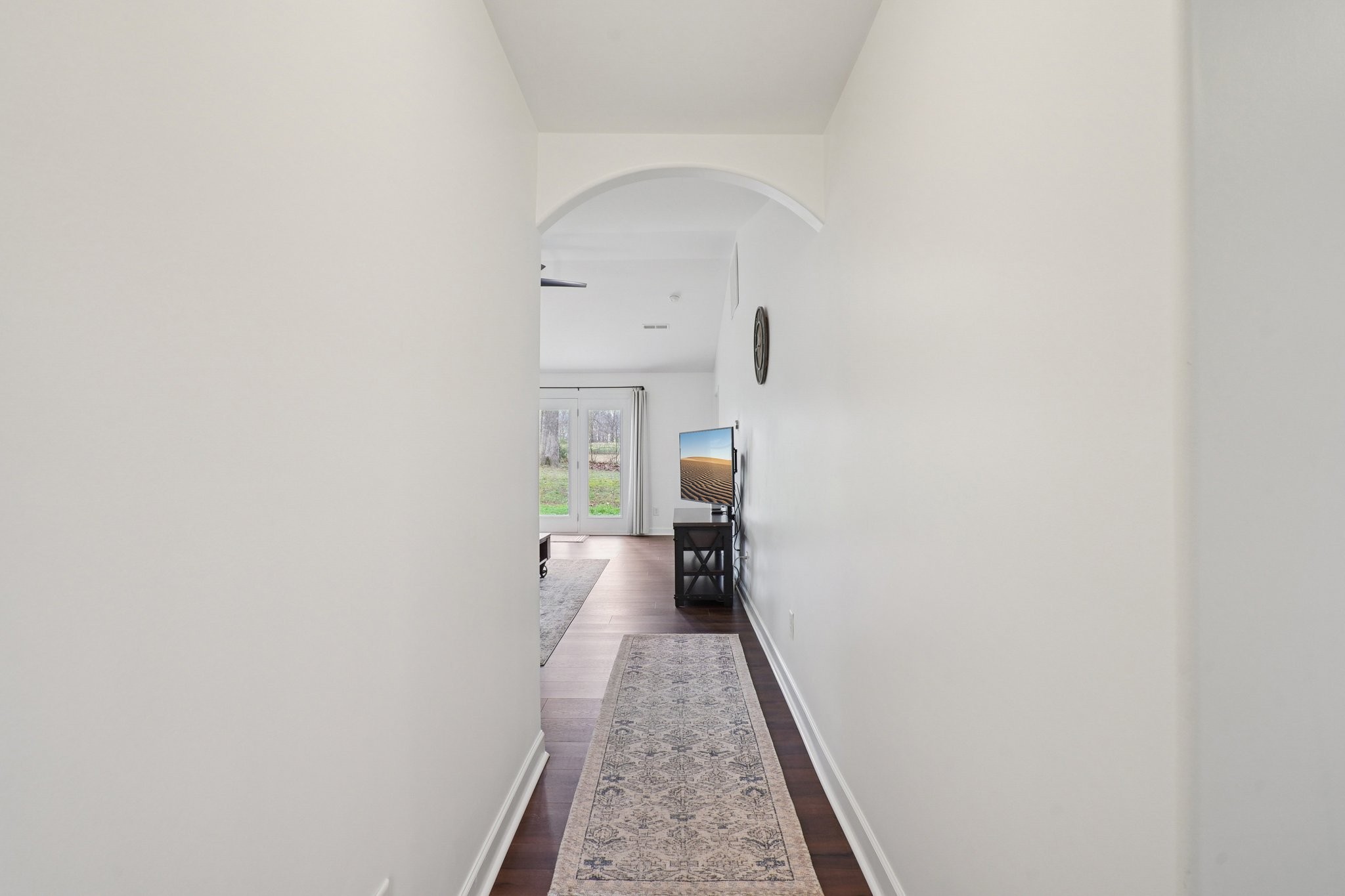 206 Hickory Pointe Dickson, TN 37055 - Photo 3 of 28 a view of a hallway with wooden floor and furniture