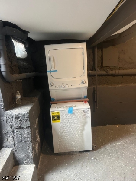 a utility room with washer and dryer