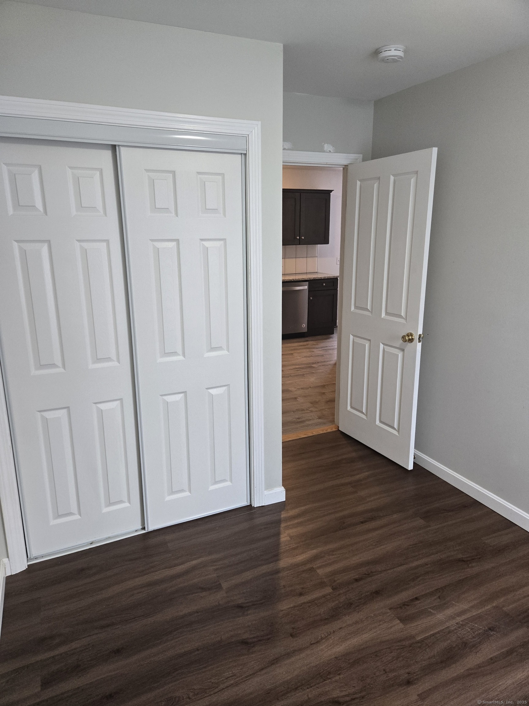 112 Liberty Street Pawcatuck, CT 06379 - Photo 11 of 22 a view of a livingroom with wooden floor