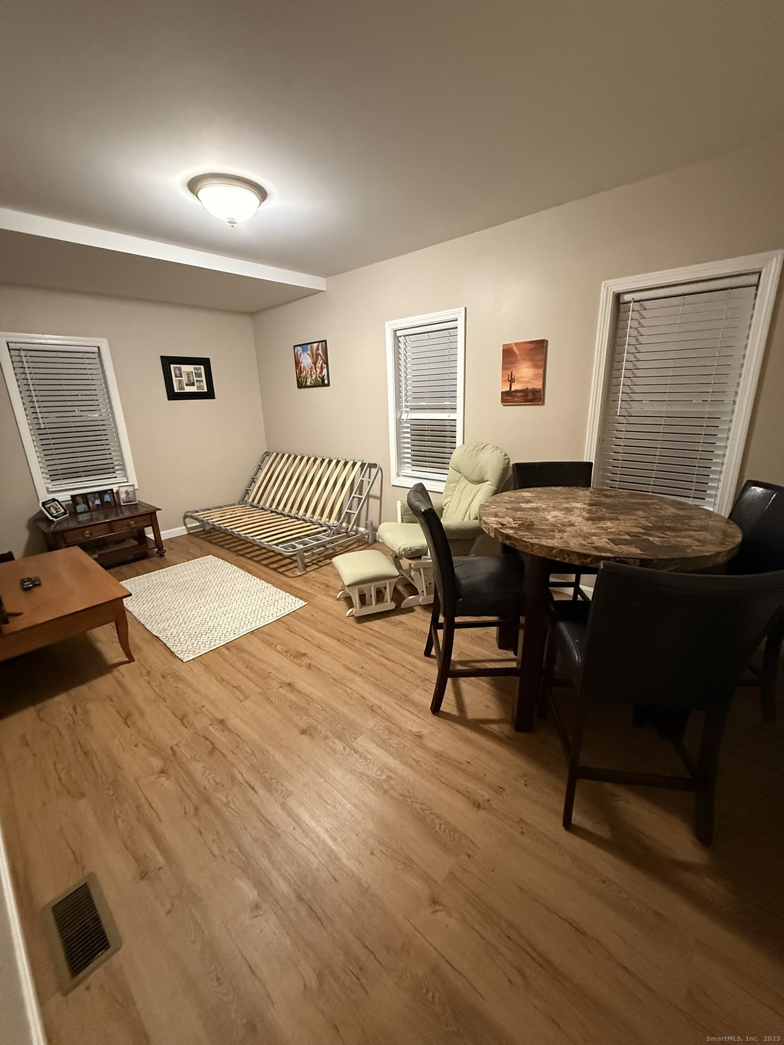 112 Liberty Street Pawcatuck, CT 06379 - Photo 17 of 22 a bedroom with a bed and a desk