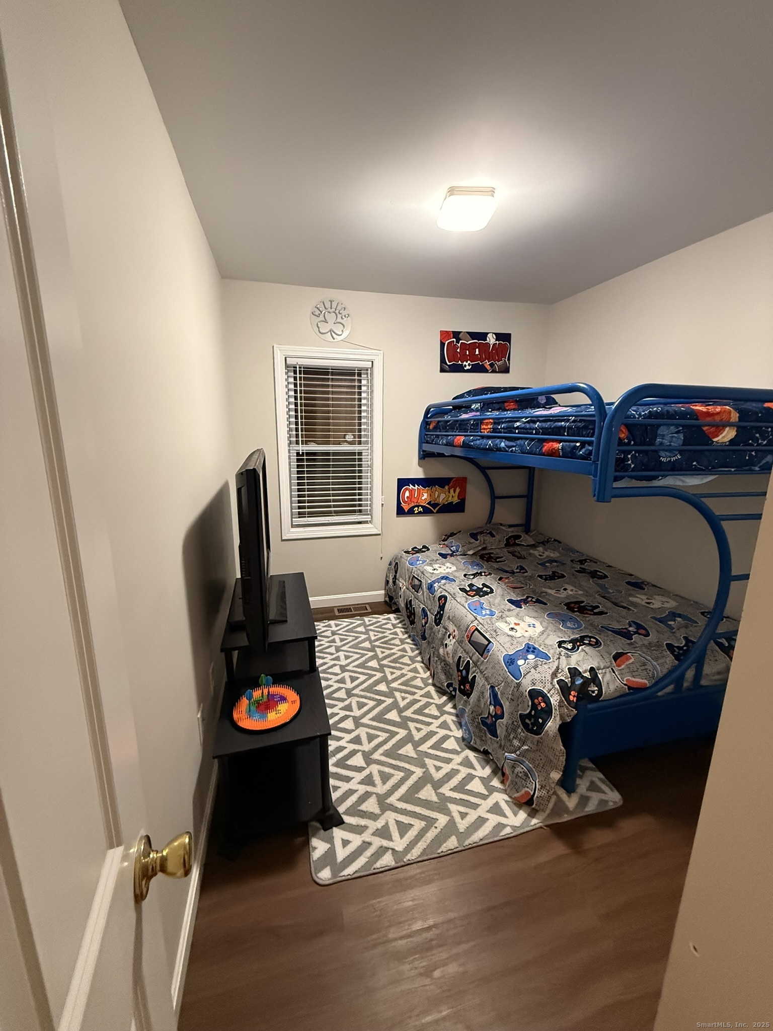 112 Liberty Street Pawcatuck, CT 06379 - Photo 20 of 22 a bedroom with furniture and a window