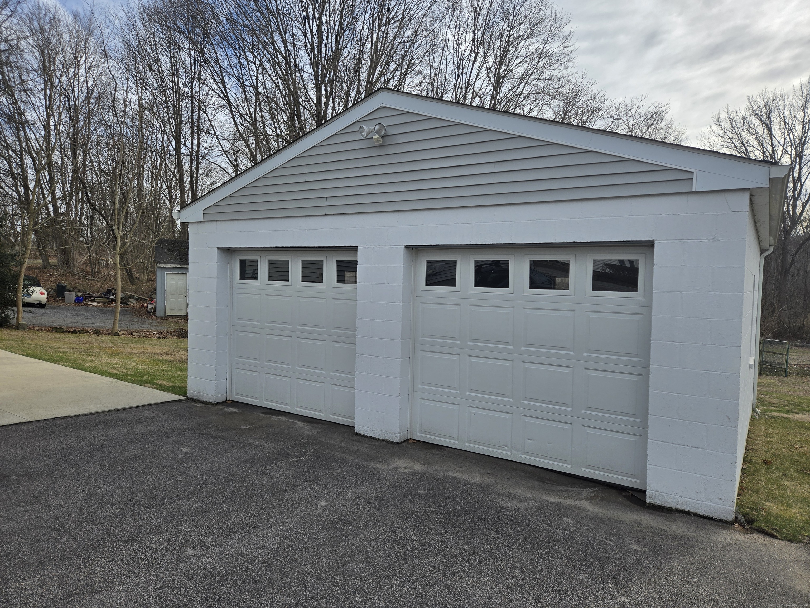 112 Liberty Street Pawcatuck, CT 06379 - Photo 3 of 22 a view of a house with a backyard