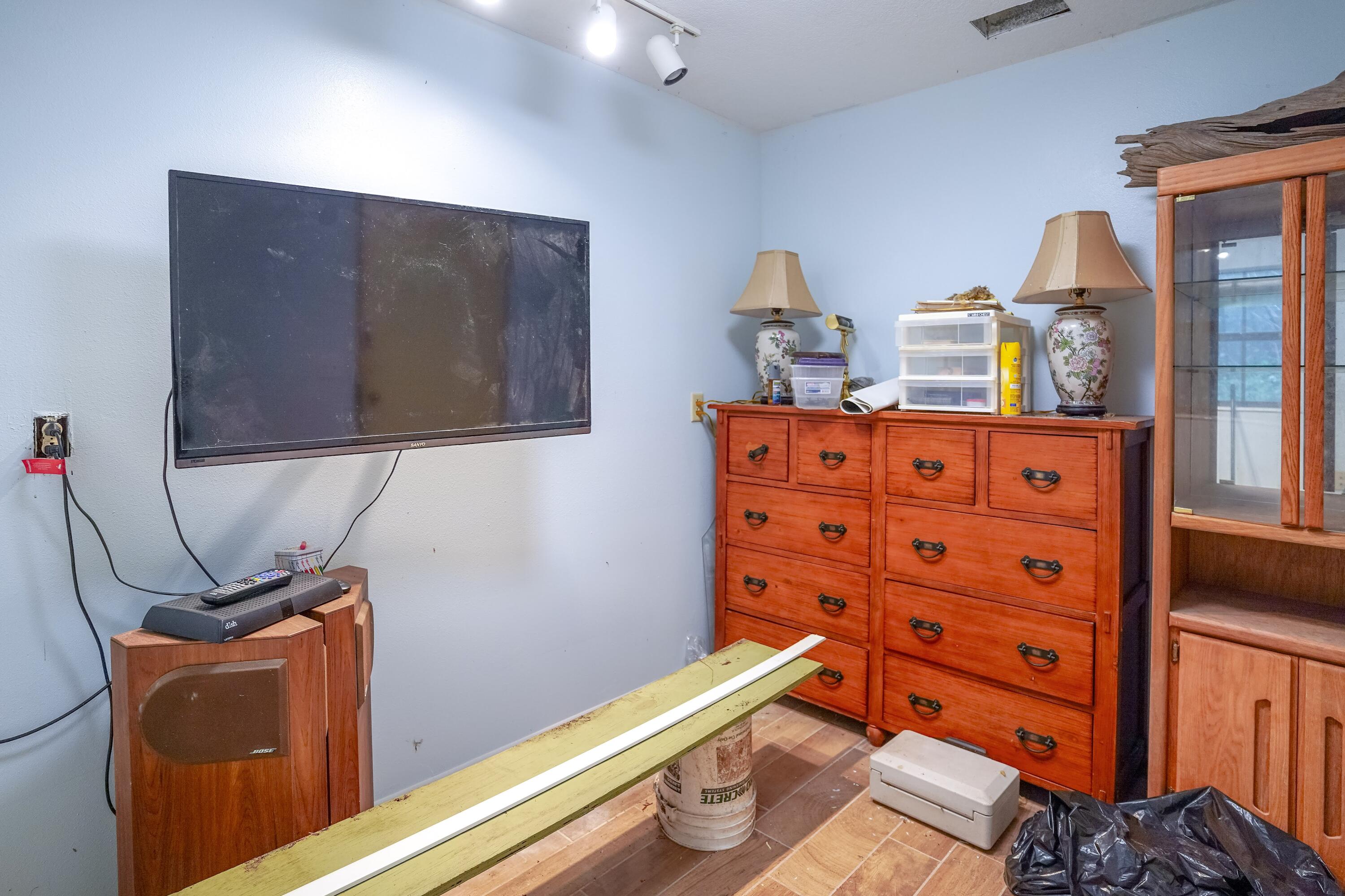 4444 Sundance Way Holt, FL 32564 - Photo 33 of 39 a room with storage and utility