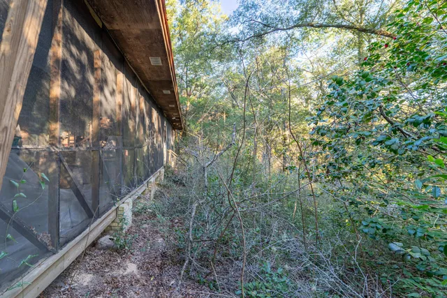 a view of a yard from a balcony