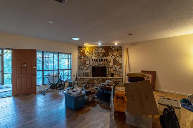 a room with furniture and wooden floor