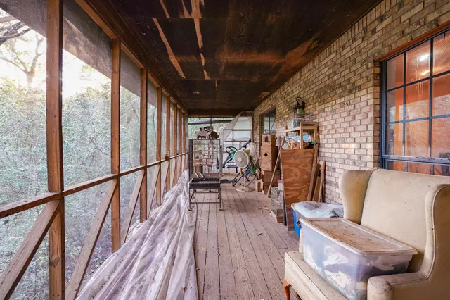 a view of chairs in wooden deck