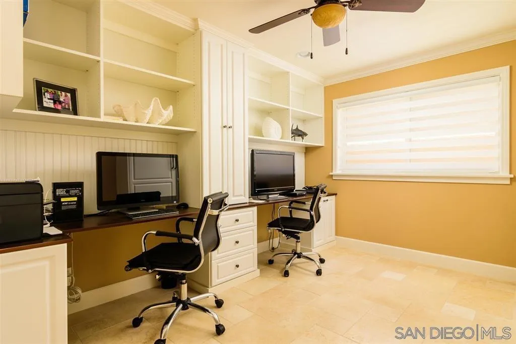 39 Green Turtle Road Coronado, CA 92118 - Photo 14 of 26 a view of a workspace with furniture and a window