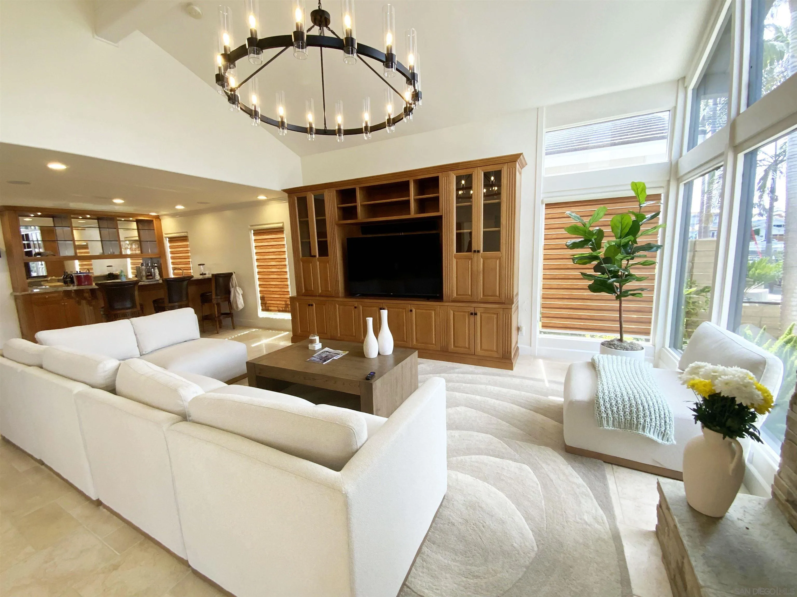 39 Green Turtle Road Coronado, CA 92118 - Photo 6 of 26 a living room with furniture and a flat screen tv