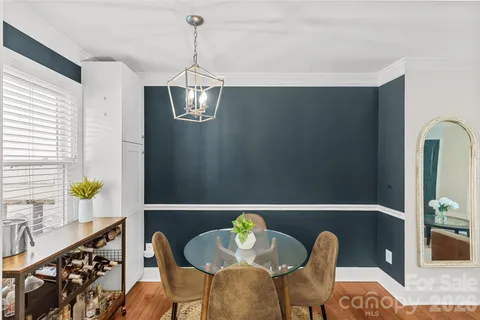 a view of livingroom and dining room with furniture