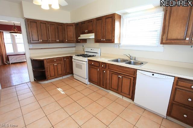 3250 Chadbourne Road Cleveland, OH 44120 - Photo 16 of 22 In this kitchen, you can notice the tile flooring and traditional wood cabinetry.