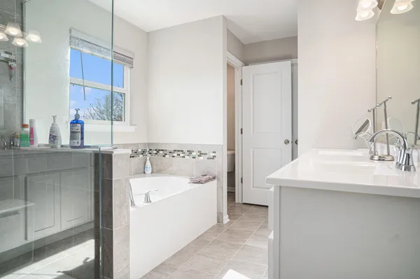 a bathroom with a sink and a bathtub