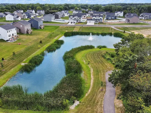 a view of a street with a building in the background