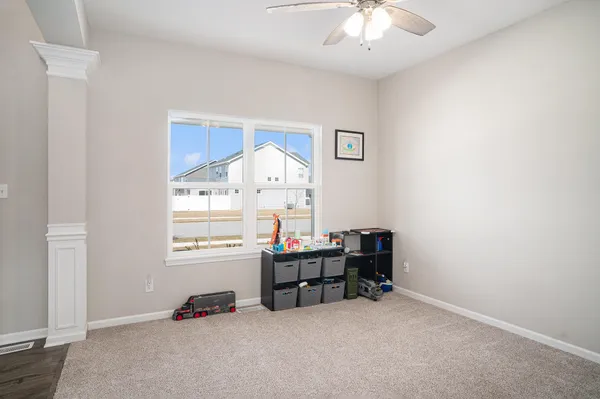 a room with toys and a chandelier