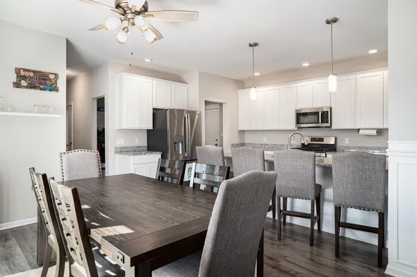 a view of a dining room with furniture