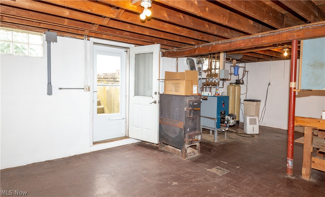 797 Trump Road Northeast Atwater, OH 44201 - Photo 21 of 35 Exterior access Basement with Woodburner