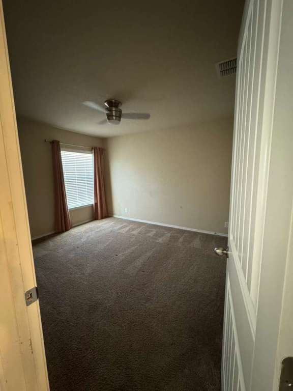 9626 Common Law Converse, TX 78109 - Photo 15 of 31 an empty room with a window