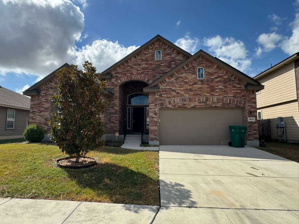 9626 Common Law Converse, TX 78109 - Photo 2 of 31 a front view of a house with garden