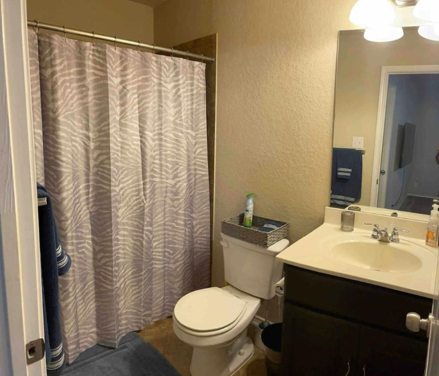 9626 Common Law Converse, TX 78109 - Photo 26 of 31 a bathroom with a sink and a toilet