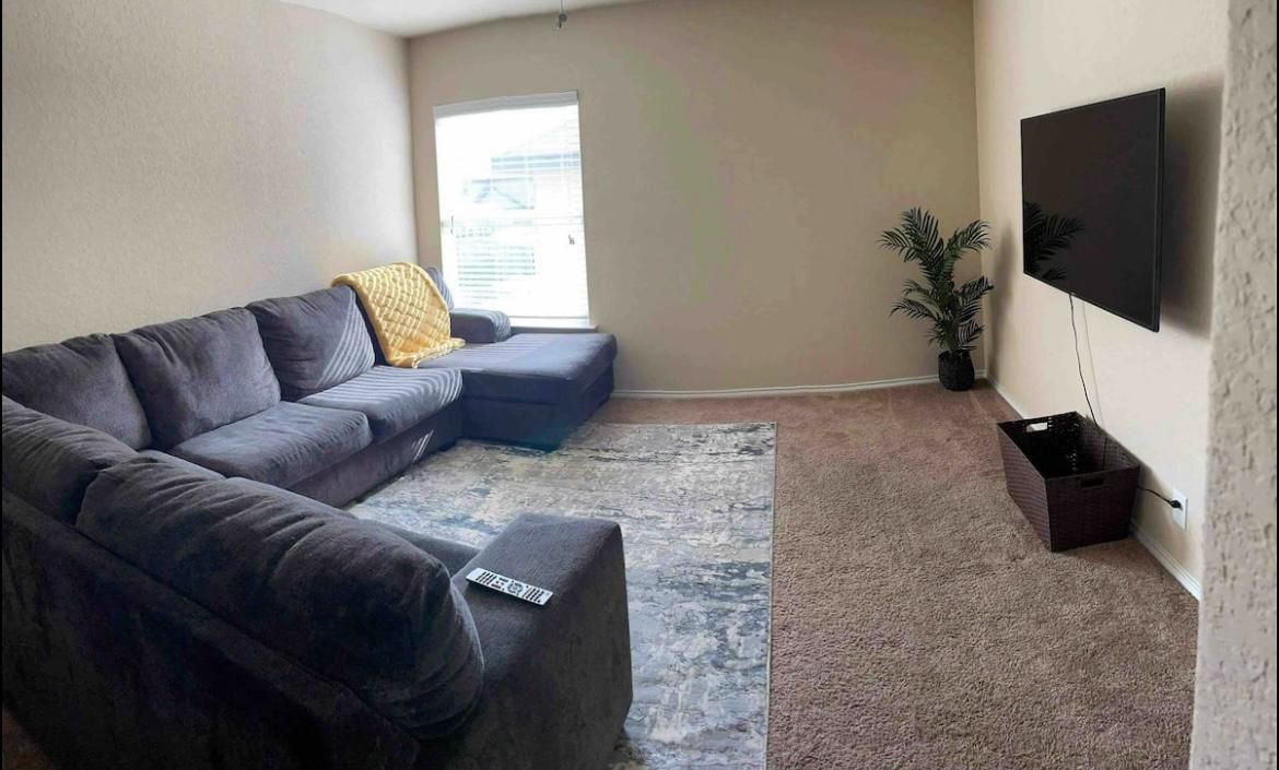 9626 Common Law Converse, TX 78109 - Photo 30 of 31 a living room with furniture and a flat screen tv