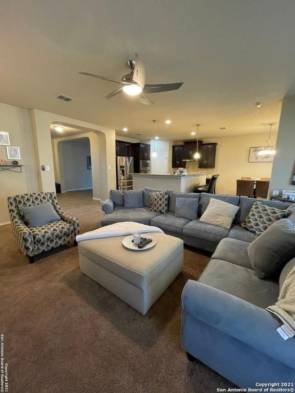 9626 Common Law Converse, TX 78109 - Photo 3 of 31 a living room with furniture and a mirror