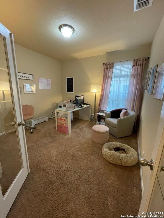 9626 Common Law Converse, TX 78109 - Photo 10 of 31 a living room with furniture and a window
