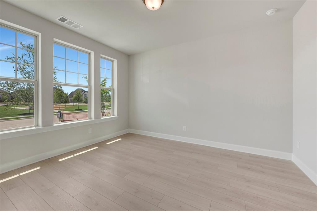 4308 Palomino Road Aubrey, TX 76227 - Photo 9 of 40 a view of an empty room with a window