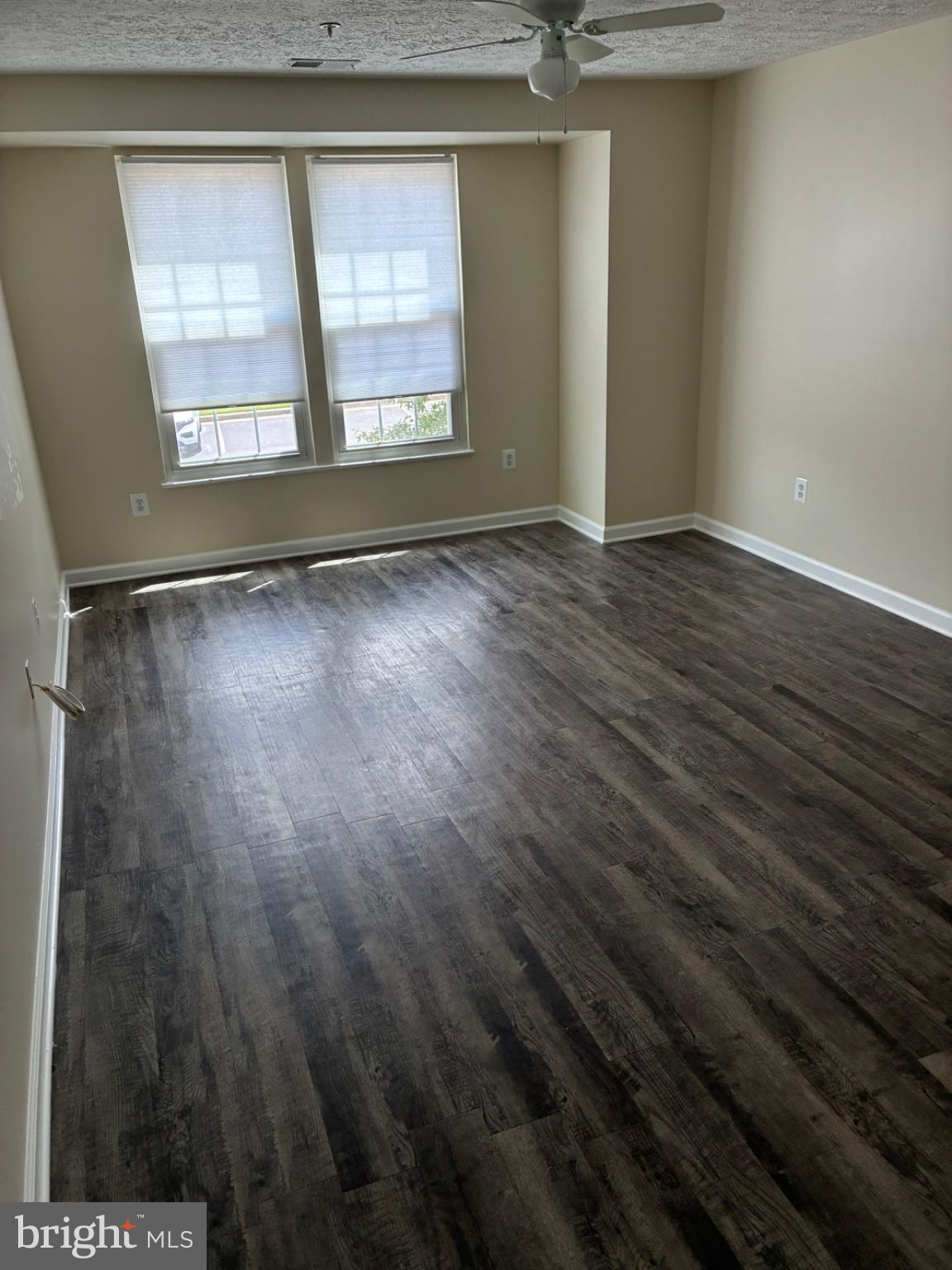 8382 Cypress Mill Road, Unit 8382 Nottingham, MD 21236 - Photo 5 of 12 Bright, airy space with modern flooring.