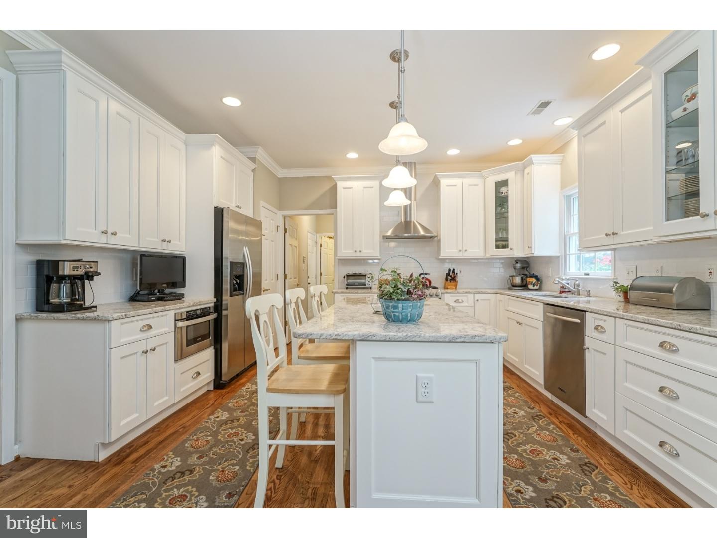 38 Stanwyck Road Mount Laurel, NJ 08054 - Photo 13 of 25 a kitchen with kitchen island granite countertop appliances cabinets and a sink