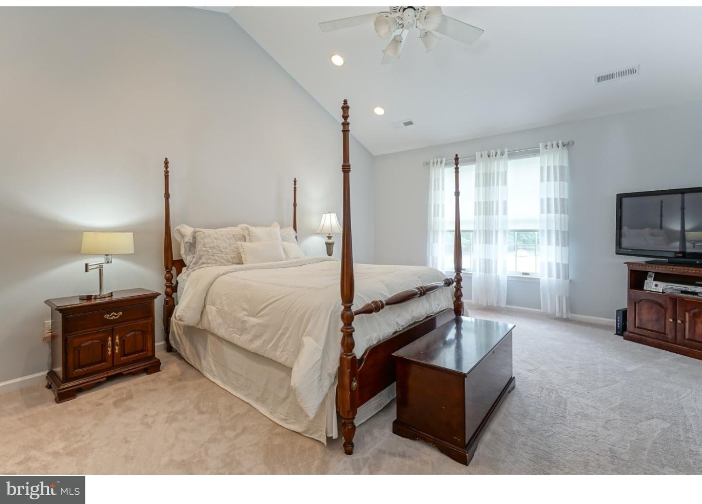 38 Stanwyck Road Mount Laurel, NJ 08054 - Photo 14 of 25 a bedroom with furniture and a flat screen tv
