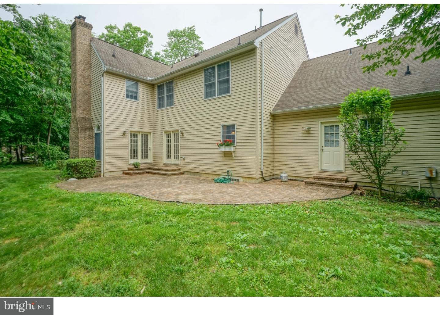 38 Stanwyck Road Mount Laurel, NJ 08054 - Photo 25 of 25 a backyard of a house with table and chairs