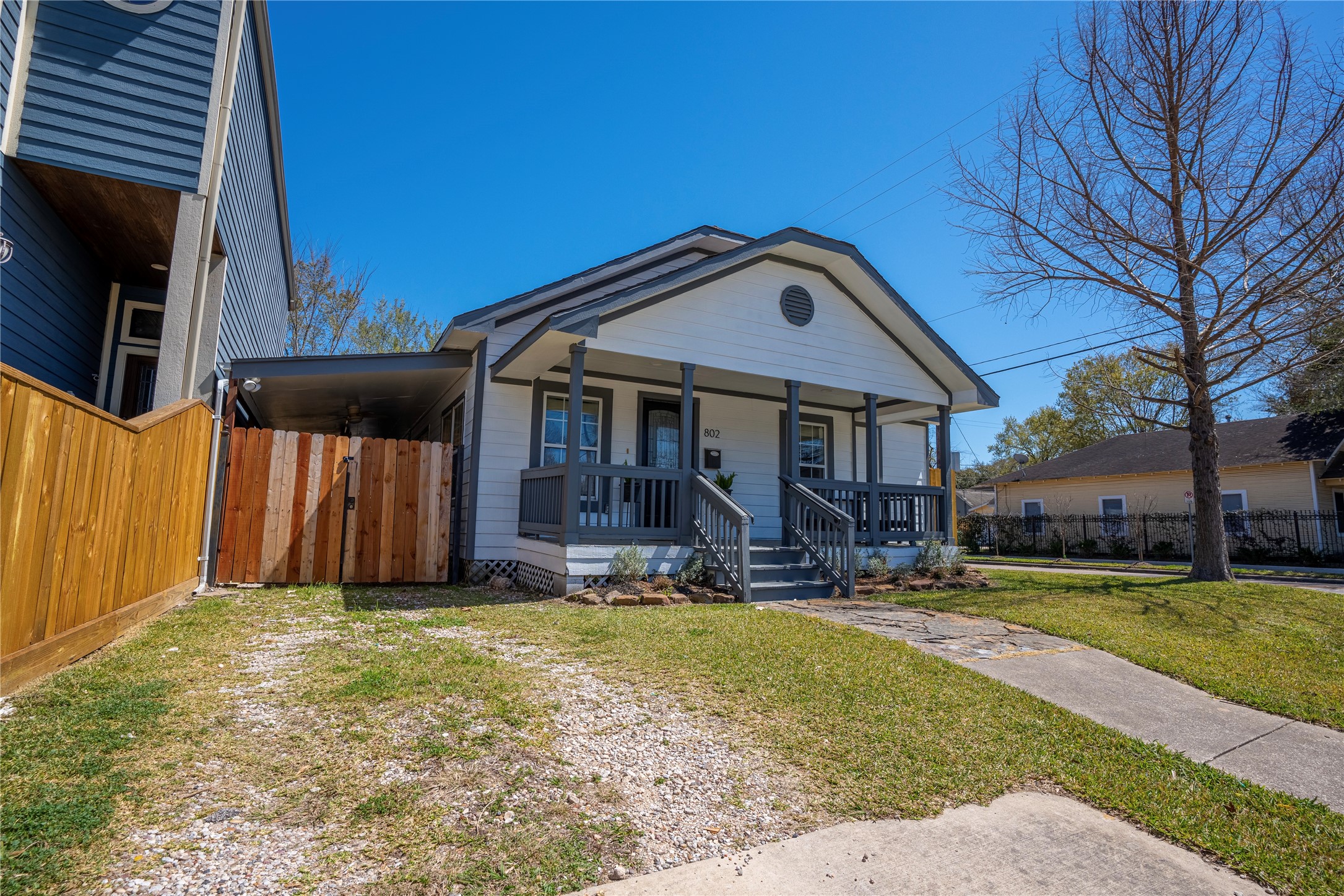802 Enid Street Houston, TX 77009 - Photo 2 of 18 a front view of a house with a yard