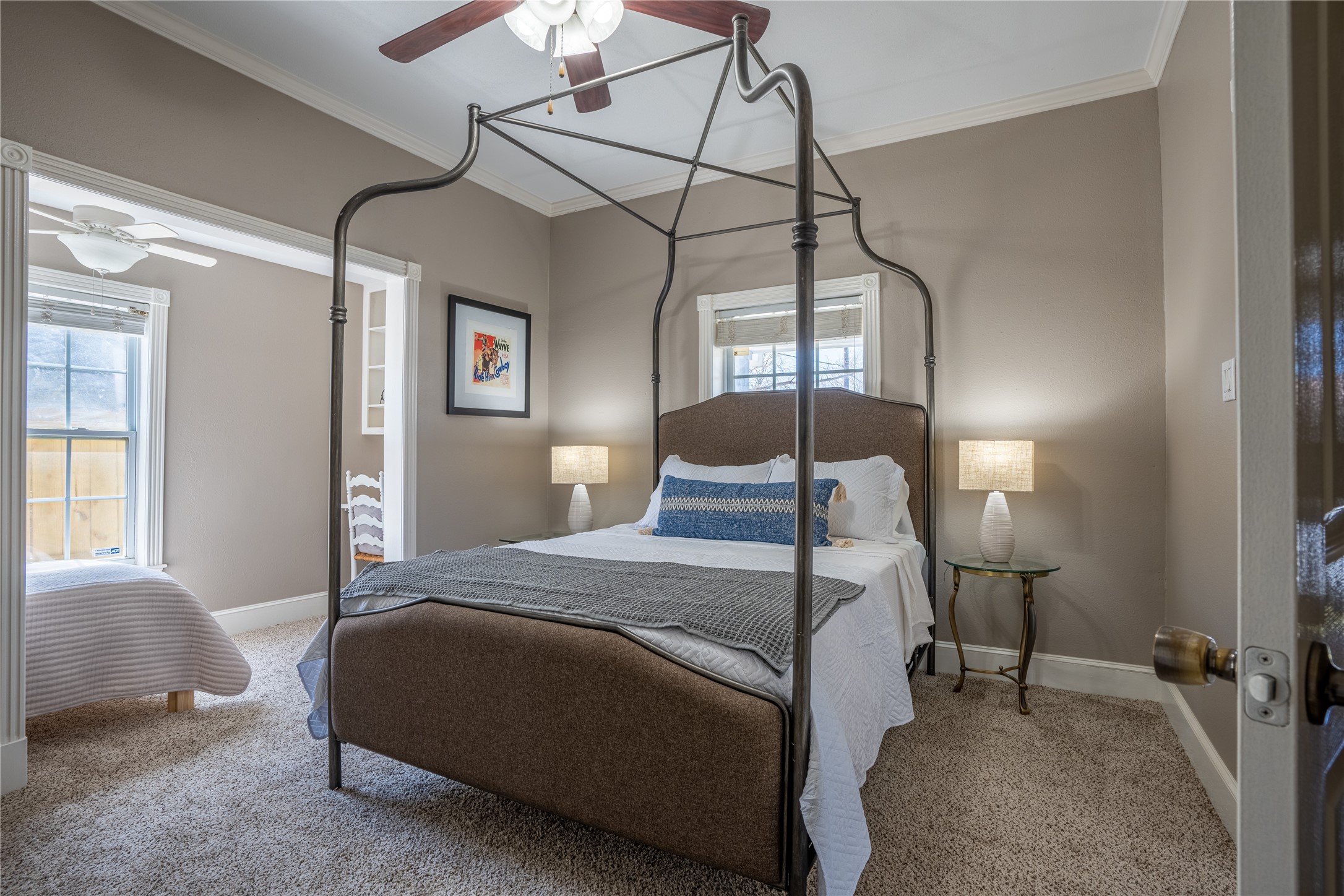 802 Enid Street Houston, TX 77009 - Photo 8 of 18 a bedroom with a bed and a lamp