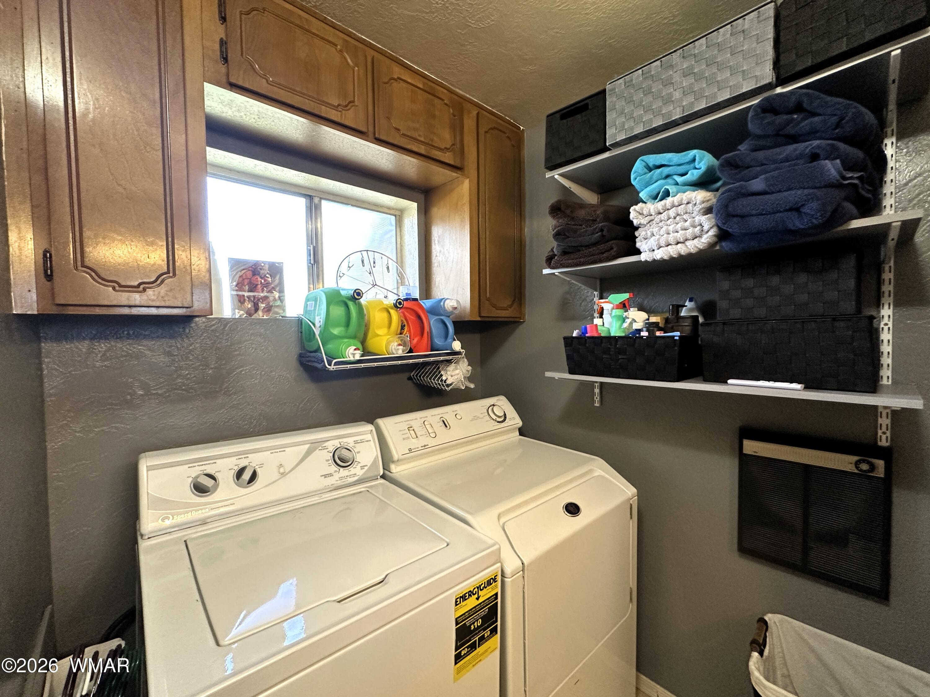 19 County Road Alpine, AZ 85920 - Photo 10 of 27 a utility room with dryer and washer