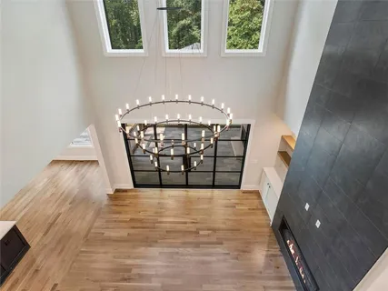 a bathroom with a double vanity sink toilet and shower