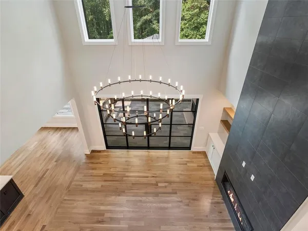 a bathroom with a double vanity sink toilet and shower