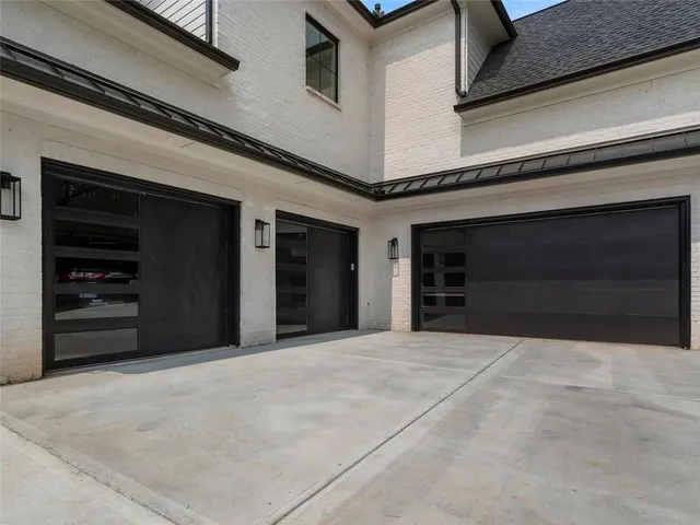 a view of a room with wooden floors and window