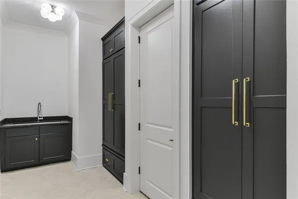 a spacious bathroom with a double vanity sink and mirror