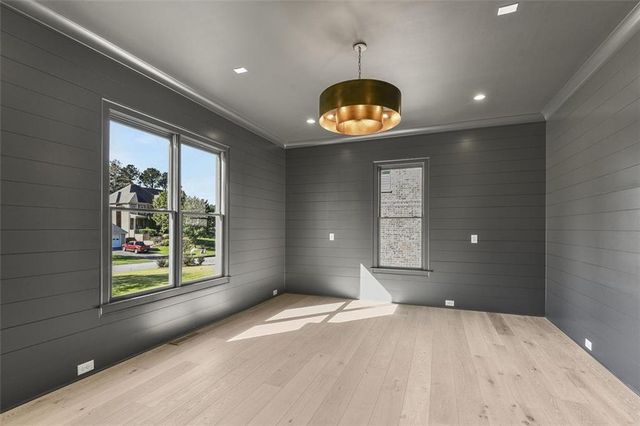 a bathroom with a double vanity sink toilet mirror and shower