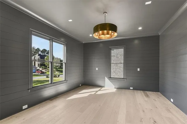a bathroom with a double vanity sink toilet mirror and shower