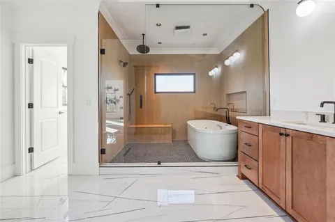 a bathroom with a sink toilet and bathtub