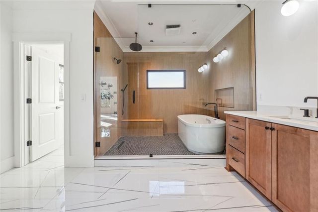 a bathroom with a sink toilet and bathtub