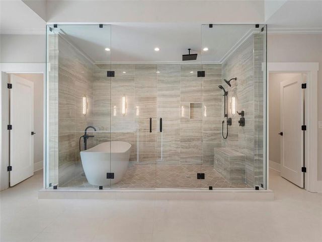a bathroom with a sink and mirror