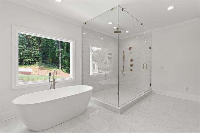 a kitchen with cabinets and window