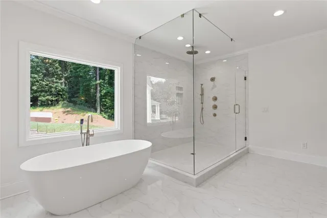 a kitchen with cabinets and window