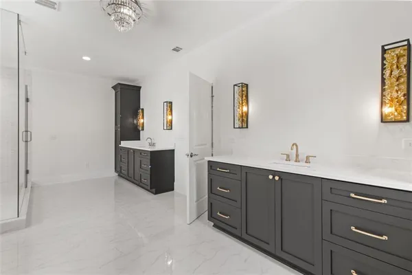 a bathroom with a tub and shower