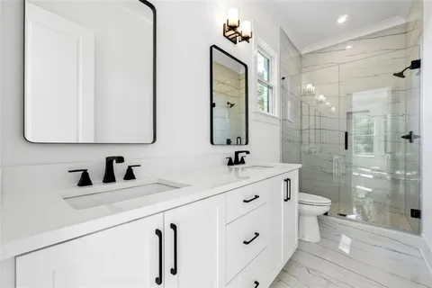 a close view of a sink and dishwasher in kitchen with dishwasher