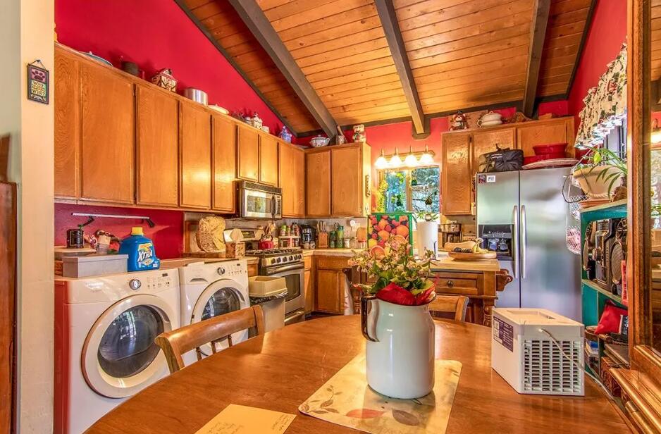 52845 Pine Cove Road Idyllwild, CA 92549 - Photo 6 of 15 a view of a kitchen with appliances and cabinets